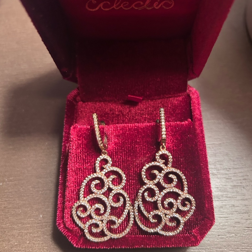 Rose gold toned scroll earrings